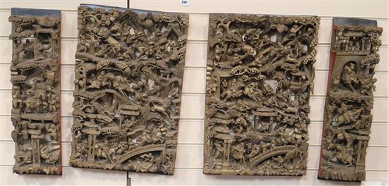 Four Chinese carved giltwood panels of battle scenes
